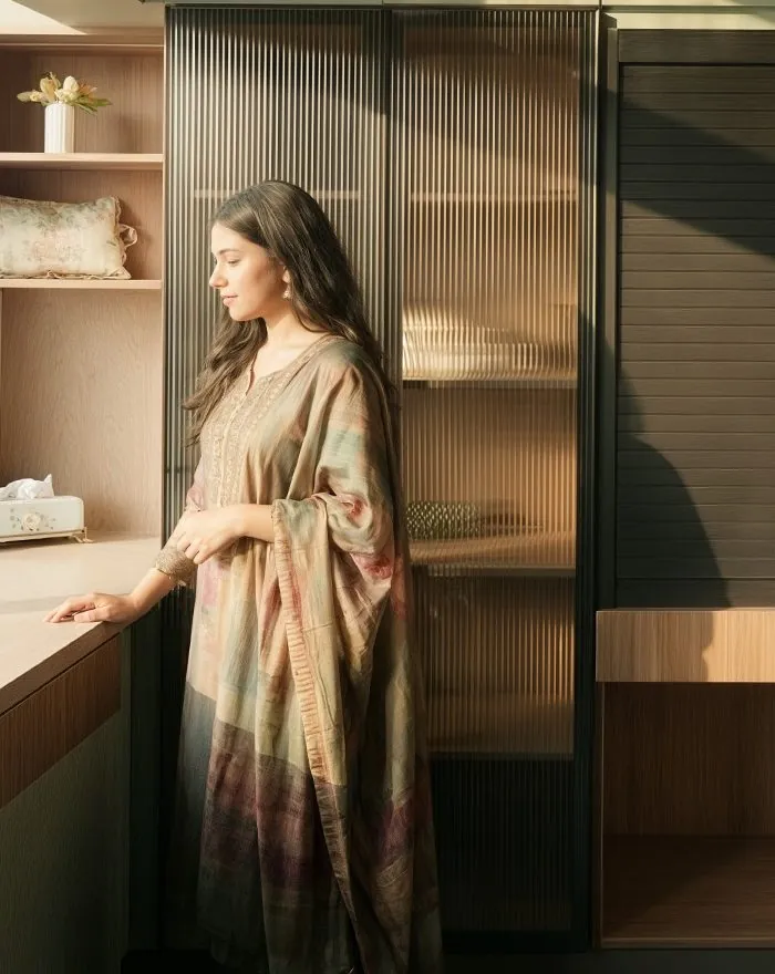 Olive kitchen with fluted glass and tambour unit