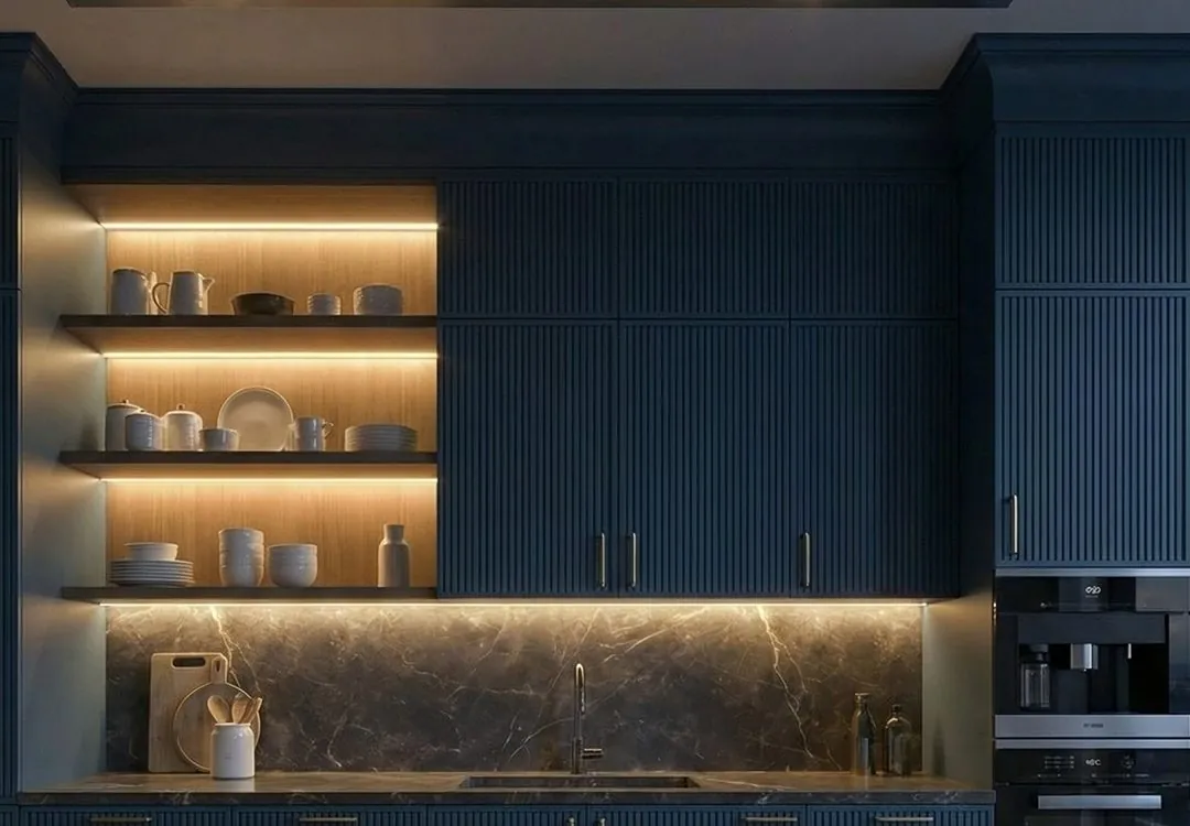 SALT Aura modular kitchen in deep blue fluted panels with lit open shelving and marble backsplash
