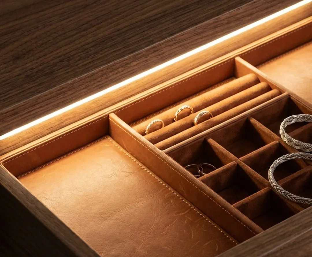 Leather-lined jewellery drawer insert with LED lighting