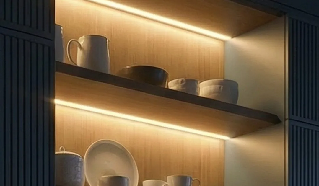 Backlit crockery display shelves in oak with ceramic tableware