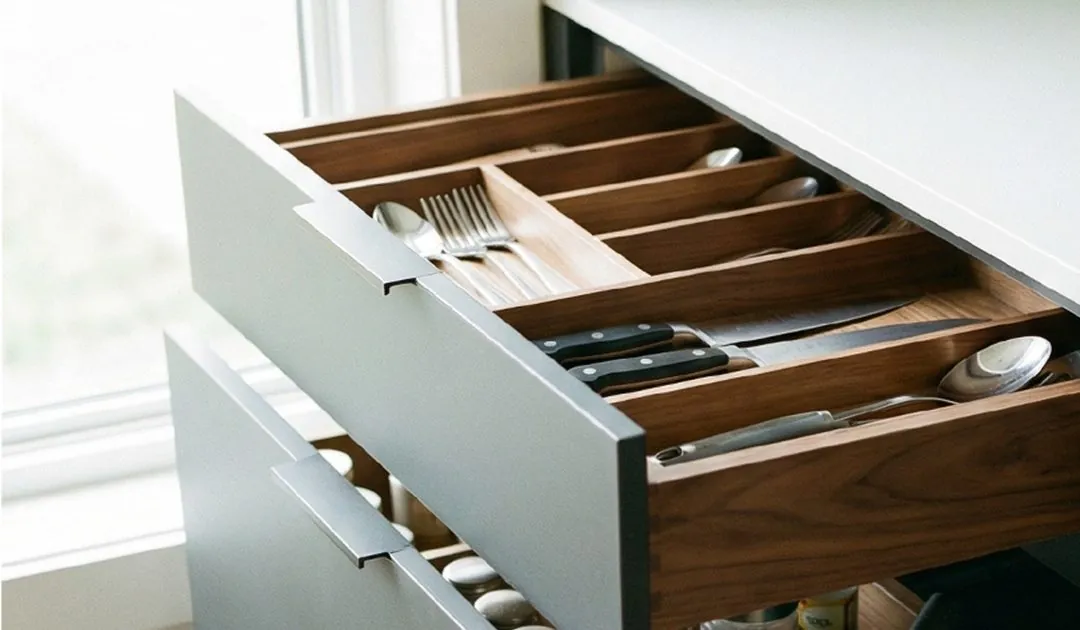 Kitchen drawers with walnut cutlery and spice organisers